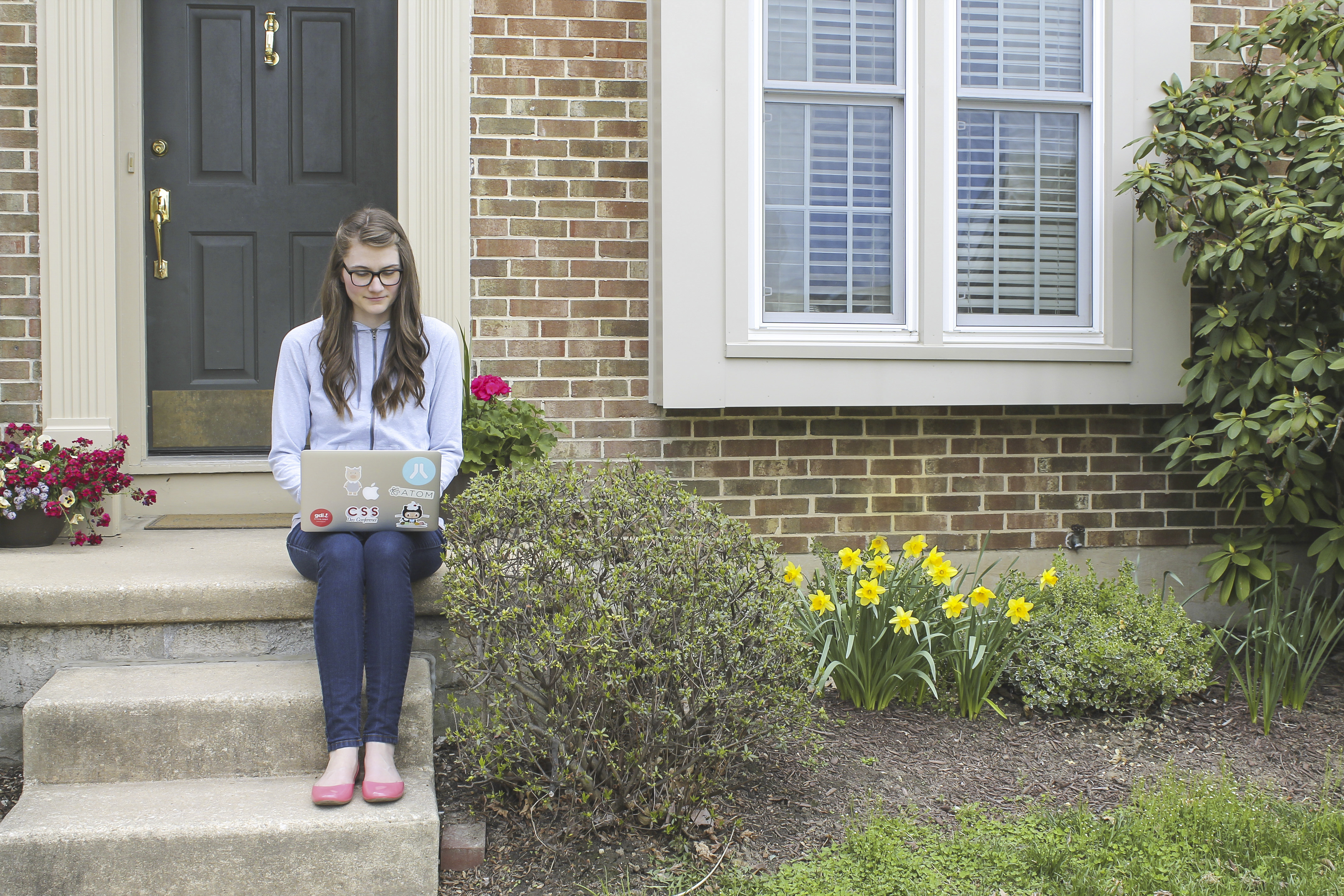 Jonie Trythall outside her house
